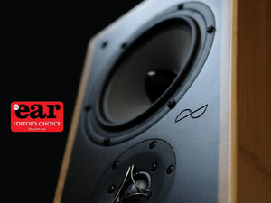 Close up of speaker with The Ear logo